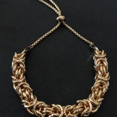 Beautiful gold tone very nice quality slider bracelet
