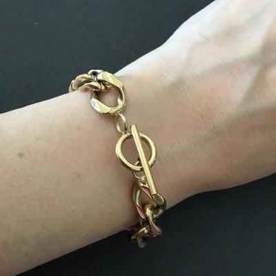 Beautiful very nice gold tone stainless steel toggle bracelet