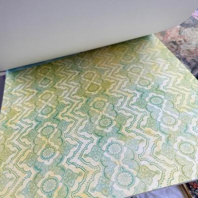 Fancy storage boxes, fancy scapbook paper pads, flowers and gold trims