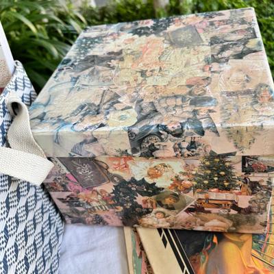 Fancy storage boxes, fancy scapbook paper pads, flowers and gold trims
