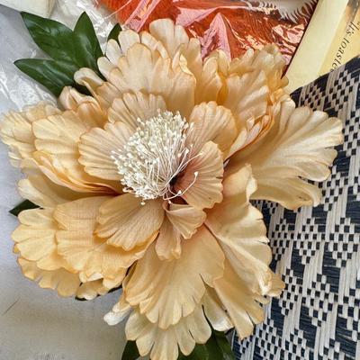 Fancy storage boxes, fancy scapbook paper pads, flowers and gold trims