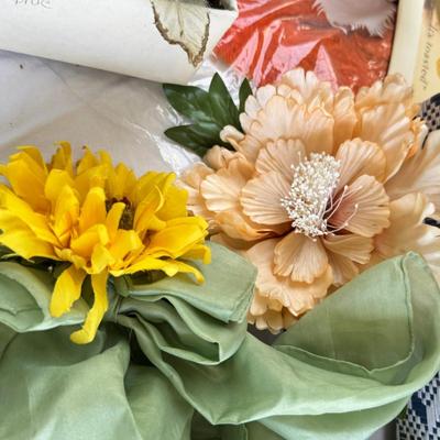 Fancy storage boxes, fancy scapbook paper pads, flowers and gold trims