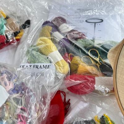 Needlework kits and yarns, Collection of hand needles, wooden needle holders, sewing kits