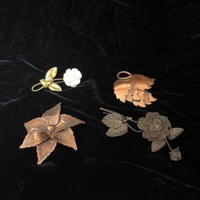 Sale Photo Thumbnail #194: Beautiful ivory carved rose pin, Silver filigree flower pin and pair of copper brooches