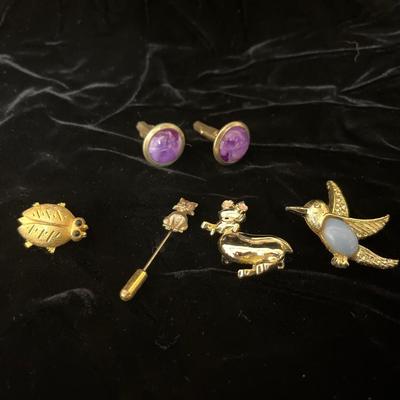 Sale Photo Thumbnail #201: Vintage purple cuff links along with bug, cat, duck and hummingbird pins