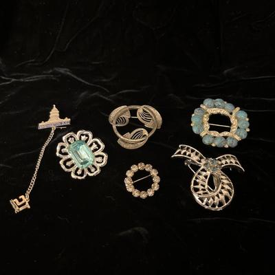 Sale Photo Thumbnail #207: 1951 Washington DC pin, gem pin, Beau sterling pin, rhinestone circle, “turquoise” brooch and ribbon brooch. Beautiful lot!