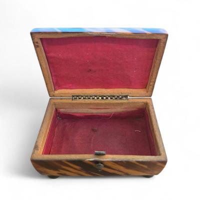 Sale Photo Thumbnail #64: Lovely miniature 19th C tortoise box. Bun feet. Unmonnogrammed silver placque at domed lid.
2.75 x 2 x 1.75