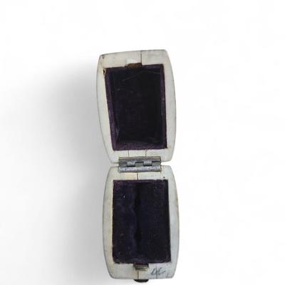 Sale Photo Thumbnail #68: 19th C. small boxes on bone feet. Stamp /ring box fitted with velvet. minor losses on corners. one replaced carved foot. on missing single foot.
silver on tops. 
2.25 x 1.25 x 1.75" -  varied.