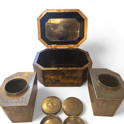 Sale Photo Thumbnail #86: Excellent tea caddy with all imserts and lids intact.
Hand-crafted in China for the European market, this English black lacquered octagonal hinged tea caddy features a decorative stenciled motif of pagodas and foliage in gilt, which contrasts beautifully 