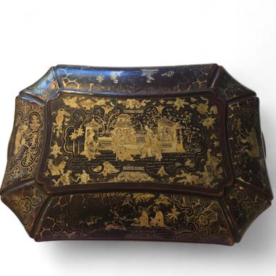 Sale Photo Thumbnail #94: Lovely lacquered sewing box with single drawer on dragon head feet. 
19th century Chinese lacquer sewing box from the Qing Dynasty. Decorated all over beautifully with intricate designs and images of ancient Chinese people and structures. No additional in