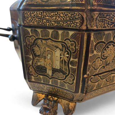 Sale Photo Thumbnail #97: Lovely lacquered sewing box with single drawer on dragon head feet. 
19th century Chinese lacquer sewing box from the Qing Dynasty. Decorated all over beautifully with intricate designs and images of ancient Chinese people and structures. No additional in