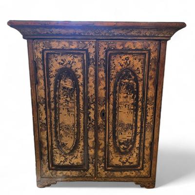 Sale Photo Thumbnail #103: Export small chest Chinois lacquer. two doors open to reveal 5 drawers with carvd button pulls.
some crackleture on top and back. 
15.75 x 8 x 14"