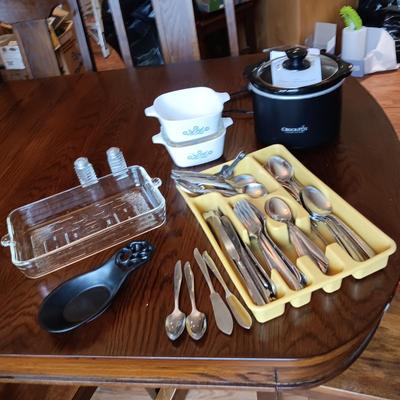 SMALLER CROCK POT, 2 SETS OF FLATWARE, SHAKERS AND BAKEWARE