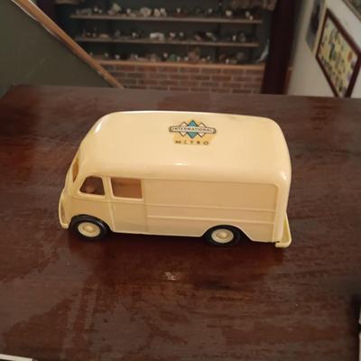 2 MARINE BAND HARMONICAS AND A PLASTIC METRO VAN