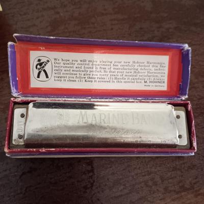 2 MARINE BAND HARMONICAS AND A PLASTIC METRO VAN