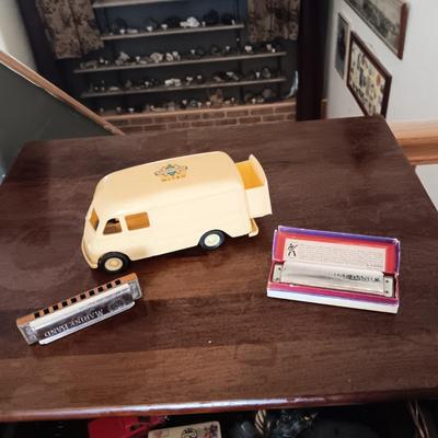 2 MARINE BAND HARMONICAS AND A PLASTIC METRO VAN