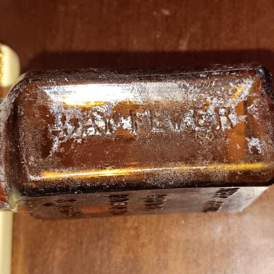2 ANTIQUE BOTTLES, TRINKET BOXES AND GLASS LIKE ROCK