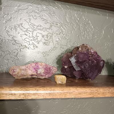 ROCKS FROM A COLLECTION LABELED FLUORITE AND PUMICE