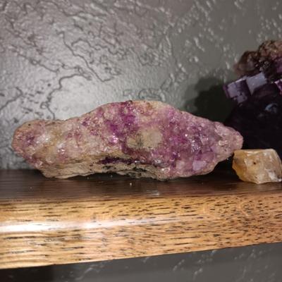 ROCKS FROM A COLLECTION LABELED FLUORITE AND PUMICE