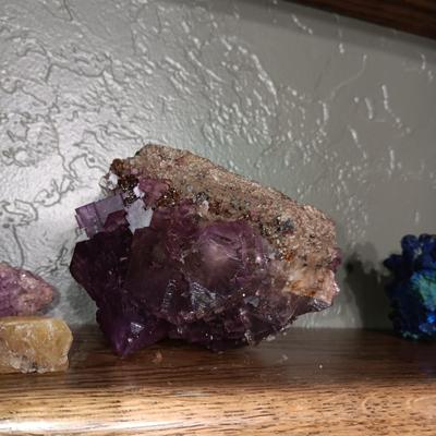 ROCKS FROM A COLLECTION LABELED FLUORITE AND PUMICE