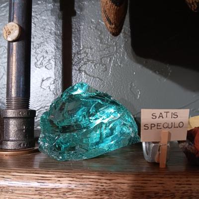 ROCKS FROM A COLLECTION LABELED SATIS SPECULO, SCORIA AND TURQUOISE