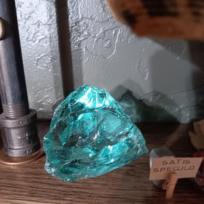 ROCKS FROM A COLLECTION LABELED SATIS SPECULO, SCORIA AND TURQUOISE