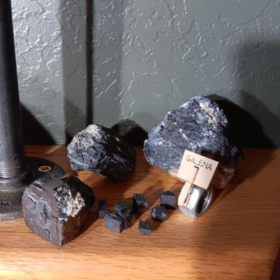 ROCKS FROM A COLLECTION LABELED GALENA, OIL SHALE & PETRIFIED WOOD