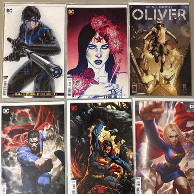 Superman, Supergirl, Wonder Woman, Oliver, Nightwing