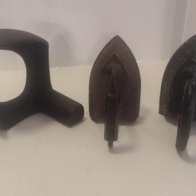 Collection of Antique Cast Iron Sad Irons and Cobblers Anvil