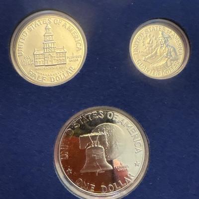 Sale Photo Thumbnail #9: Three proof sets 
Each set includes: 
Eisenhower half dollar
Kennedy half dollar
Washington Quarter
All minted in 40% Silver.