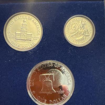 Sale Photo Thumbnail #10: Three proof sets 
Each set includes: 
Eisenhower half dollar
Kennedy half dollar
Washington Quarter
All minted in 40% Silver.