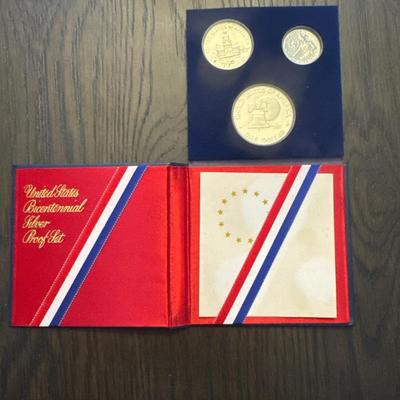 Sale Photo Thumbnail #13: Three proof sets 
Each set includes: 
Eisenhower half dollar
Kennedy half dollar
Washington Quarter
All minted in 40% Silver.