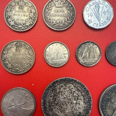 Sale Photo Thumbnail #54: Coins are from Canada, Mexico, Great Britain. 
Most are made of silver and pre-date 1940. 
Notable coins include: 
(2) 1919 Canadian $.25 (92.5% Silver) 
1912 Canadian $.25 (92.5% Silver)
1876 Great Britain 1 Schilling (92.5% Silver)
1964 Mexican one peso