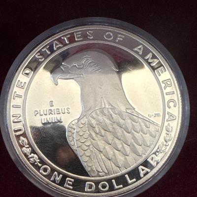 Sale Photo Thumbnail #116: Proof coins 
Each made of 90% Silver and minted in San Francisco. 

1983 discusses thrower with bust of American eagle on reverse. 

1984 Gateway to Olympic Colosseum with American eagle on reverse. 

Each coin is 1.50inches in diameter weighing .86 Troy 