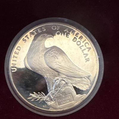 Sale Photo Thumbnail #115: Proof coins 
Each made of 90% Silver and minted in San Francisco. 

1983 discusses thrower with bust of American eagle on reverse. 

1984 Gateway to Olympic Colosseum with American eagle on reverse. 

Each coin is 1.50inches in diameter weighing .86 Troy 
