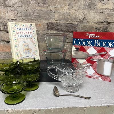 Sale Photo Thumbnail #278: Better Homes and Prairie Kitchen Sampler cookbooks, modern pyrex fridge set, vintage clear crystal cut gravy boat & sterling? gravy ladle, and five vintage Indiana green glass sherbets in the King’s Crown pattern
