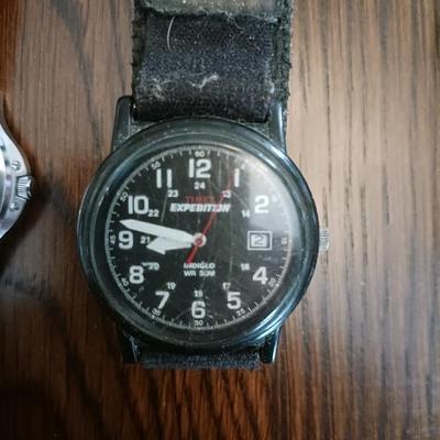 3 MEN'S WATCHES AND A TRAVELING ALARM CLOCK