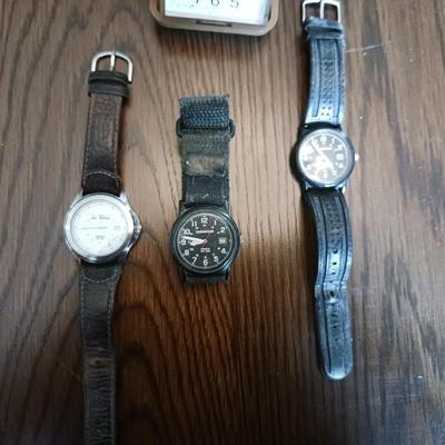 3 MEN'S WATCHES AND A TRAVELING ALARM CLOCK