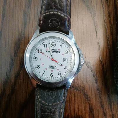 3 MEN'S WATCHES AND A TRAVELING ALARM CLOCK