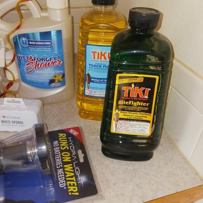 CLEANING SUPPLIES, FLASHLIGHT THAT RUNS ON WATER AND TIKI TORCH FUEL
