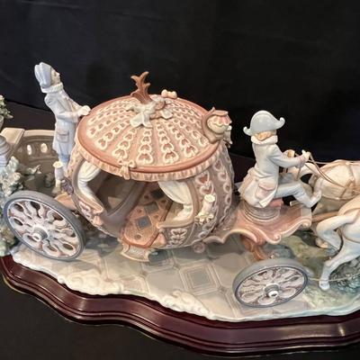Sale Photo Thumbnail #204: RARE SIGNED LLADRO 1493 CINDERELLA COACH AT THE STROKE OF TWELVE LTD ED RETIRED. Up for sale is this Pre-owned Lladro "Cinderella" At the Stroke of Twelve. Large Figurine w/ hardwood base. Please view all photos and description before you buy. Presented f