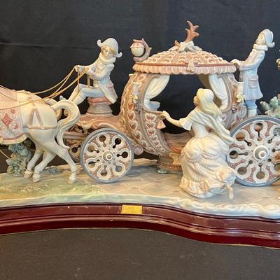 Sale Photo Thumbnail #200: RARE SIGNED LLADRO 1493 CINDERELLA COACH AT THE STROKE OF TWELVE LTD ED RETIRED. Up for sale is this Pre-owned Lladro "Cinderella" At the Stroke of Twelve. Large Figurine w/ hardwood base. Please view all photos and description before you buy. Presented f