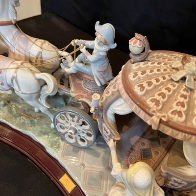 Sale Photo Thumbnail #208: RARE SIGNED LLADRO 1493 CINDERELLA COACH AT THE STROKE OF TWELVE LTD ED RETIRED. Up for sale is this Pre-owned Lladro "Cinderella" At the Stroke of Twelve. Large Figurine w/ hardwood base. Please view all photos and description before you buy. Presented f