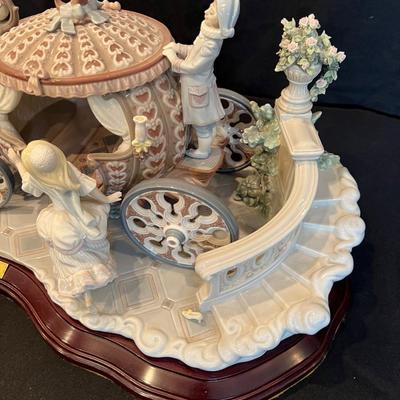 Sale Photo Thumbnail #210: RARE SIGNED LLADRO 1493 CINDERELLA COACH AT THE STROKE OF TWELVE LTD ED RETIRED. Up for sale is this Pre-owned Lladro "Cinderella" At the Stroke of Twelve. Large Figurine w/ hardwood base. Please view all photos and description before you buy. Presented f