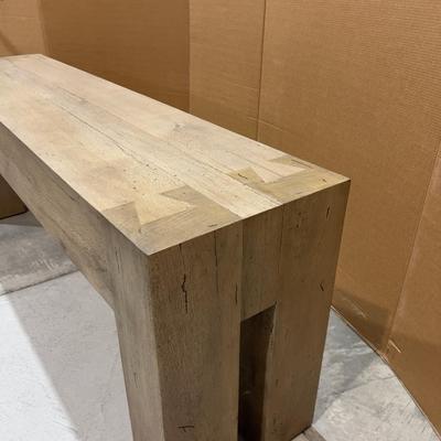 Sale Photo Thumbnail #236: Abaso Console Table Wormwood. Not used. Minor Water Damage on one end.  Please provider moving assistance and secure transportation and or packing materials for moving.
