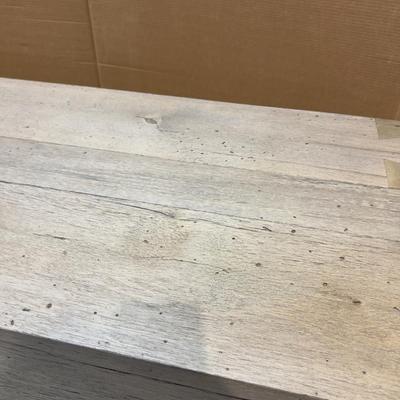 Sale Photo Thumbnail #237: Abaso Console Table Wormwood. Not used. Minor Water Damage on one end.  Please provider moving assistance and secure transportation and or packing materials for moving.