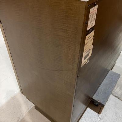 Sale Photo Thumbnail #275: Not used. Brass Rings on Doors needs to be re-glued. Damaged but fixable. Wood with Metal Legs. Lease provider moving assistance and secure transportation and or packing materials for moving. Measures 48 X 20 X 36" Tall.  