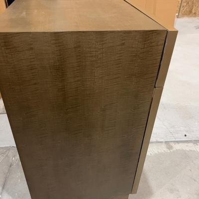 Sale Photo Thumbnail #276: Not used. Brass Rings on Doors needs to be re-glued. Damaged but fixable. Wood with Metal Legs. Lease provider moving assistance and secure transportation and or packing materials for moving. Measures 48 X 20 X 36" Tall.  
