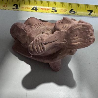 Sale Photo Thumbnail #147: The image shows a vintage 1960s promotional clay figurine used by the pharmaceutical company Schering for their drug Etrafon, which was prescribed for anxiety and depression. 
About the Figurine:
Origin and Style: It is a reproduction of an ancient Pre-Co