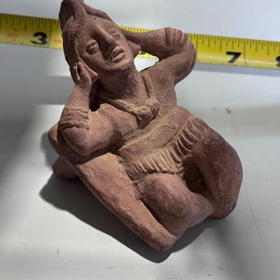 Sale Photo Thumbnail #148: The image shows a vintage 1960s promotional clay figurine used by the pharmaceutical company Schering for their drug Etrafon, which was prescribed for anxiety and depression. 
About the Figurine:
Origin and Style: It is a reproduction of an ancient Pre-Co